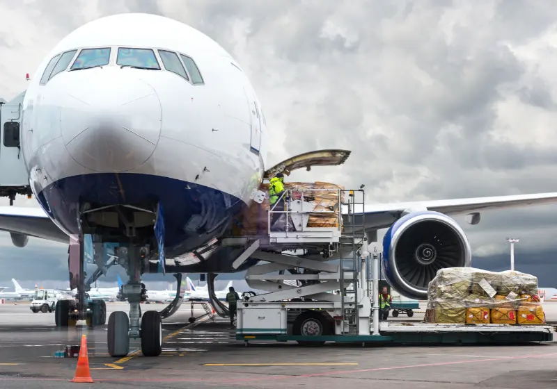 Air freight packages on plane
